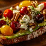 Avocado Toast with Feta Cheese, Cherry Tomatoes, Cranberries, and Walnuts