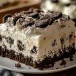 Irresistible Silky Cookies and Cream Poke Cake